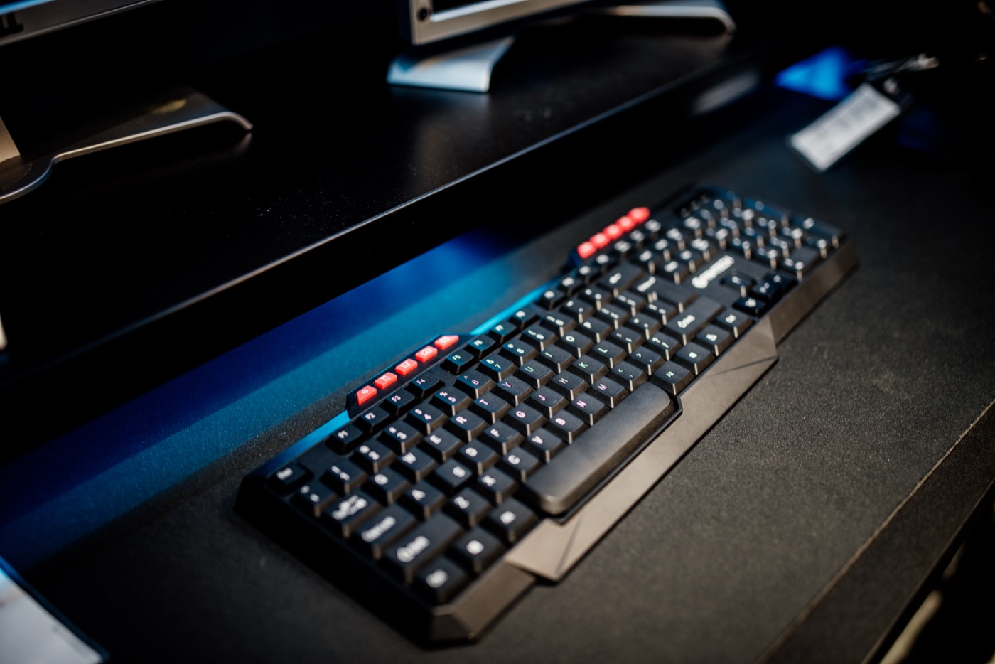 Modern workspace desk with keyboard and computer setup