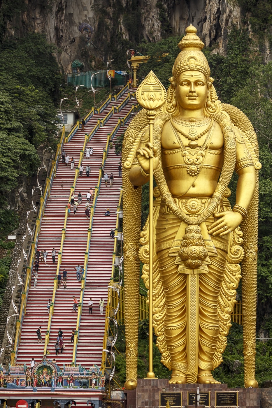 Batu Caves iconic limestone caves and entrance statue in Selangor Malaysia